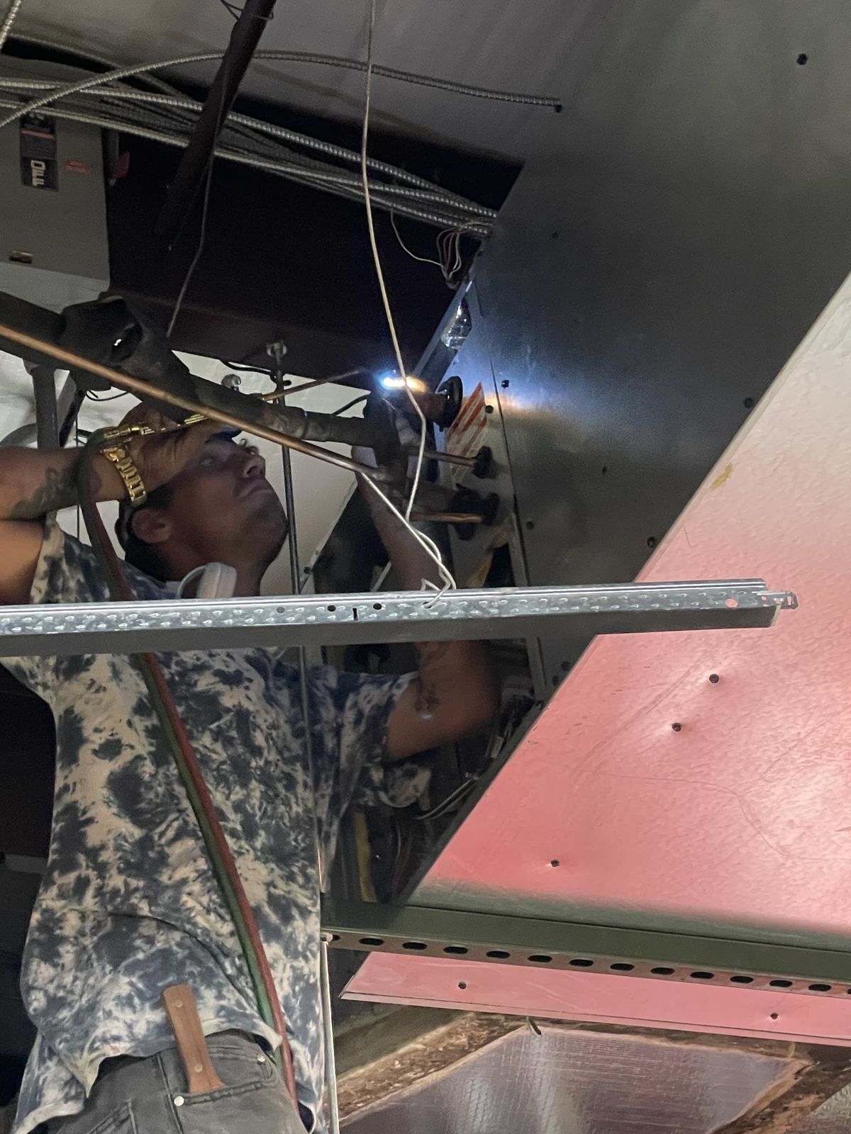 Metal fabrication work by the Arctic Air Conditioning crew