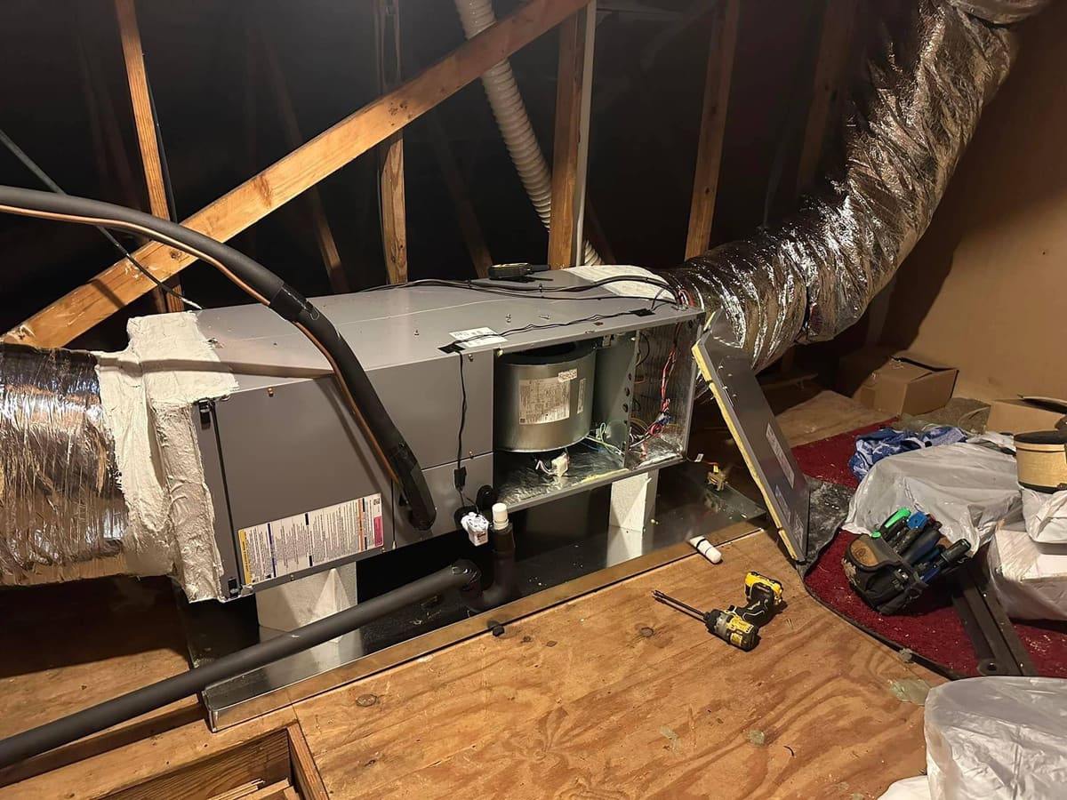 Horizontal air handler set on attic decking