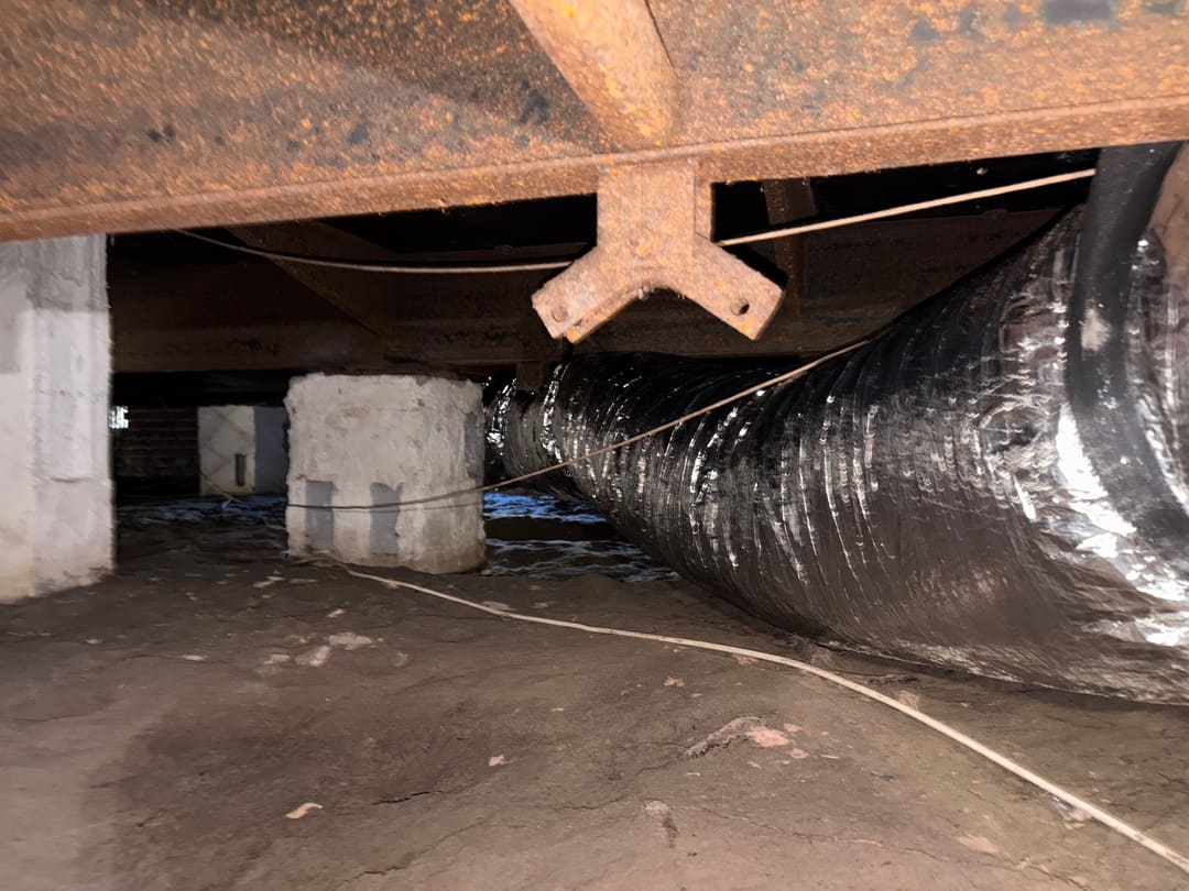 Flex duct running through a crawlspace