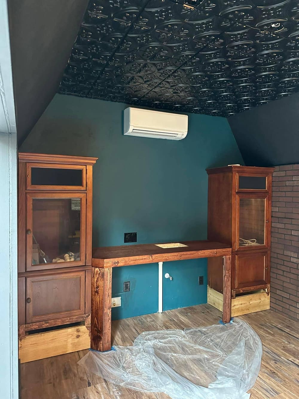 Wall-mounted ductless indoor unit in a finished room